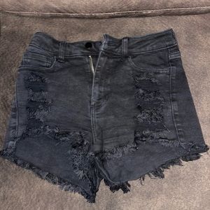 Black ripped shorts